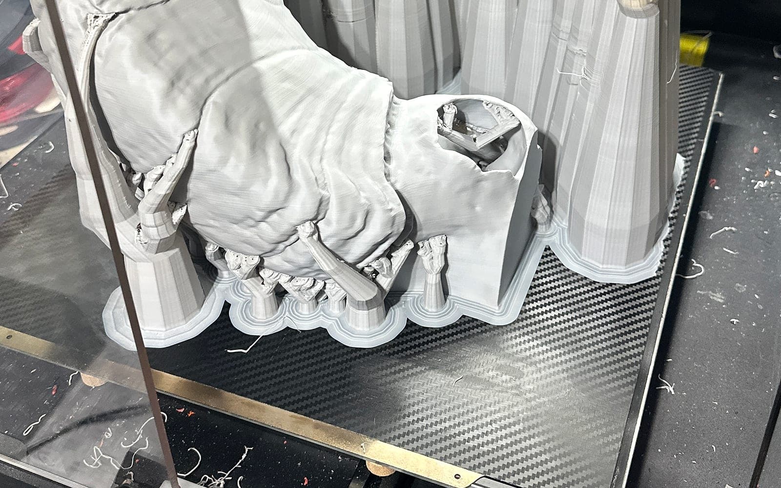 Multi-part STL printing service parts arranged on a printer bed